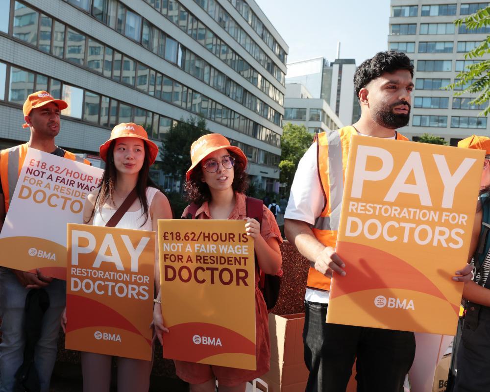 Three hospital doctors’ groups threaten to coordinate strike action in England